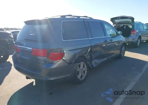 2010 Honda Odyssey Touring from USA, damaged, VIN 5FNRL3H95AB064850